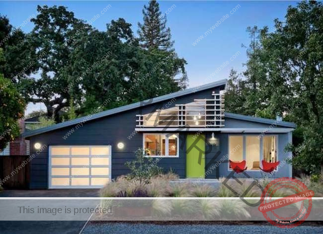 A mid-century modern house, painted dark brown with a lime green front door. 