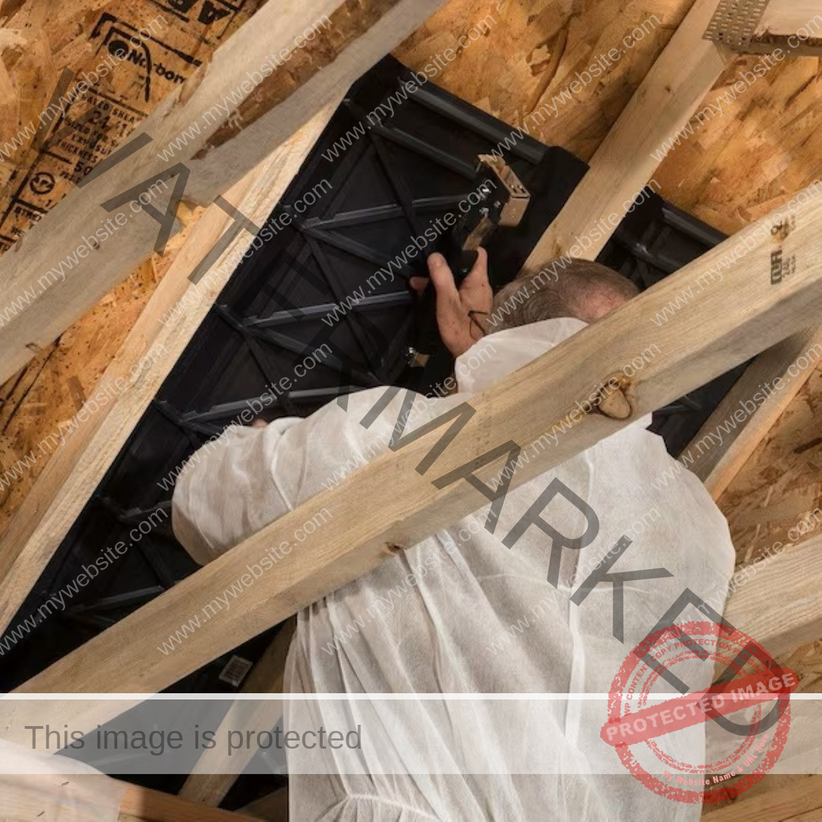 A person is working to add a rafter vent under the roof.